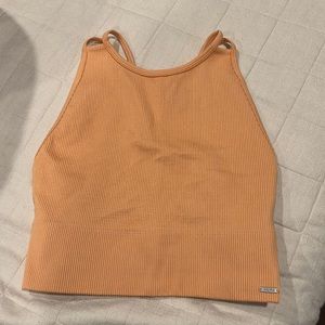 Gilly Hicks orange workout top, size M